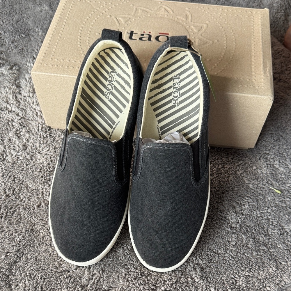 Taos Dandy Footwear Women’s Black Canvas Slip-Ons